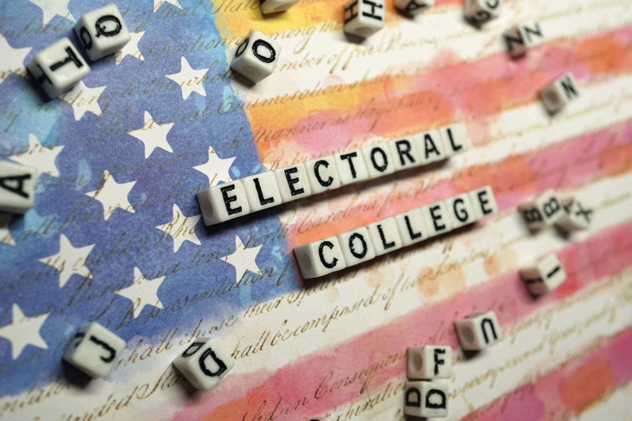 Electoral College Spelled with Dice against U.S. Flag