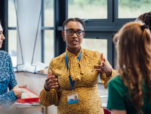 Students learning from teacher