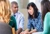 Emotional Asian Woman Talks in a Group Emotional Asian Woman Talks in a Group